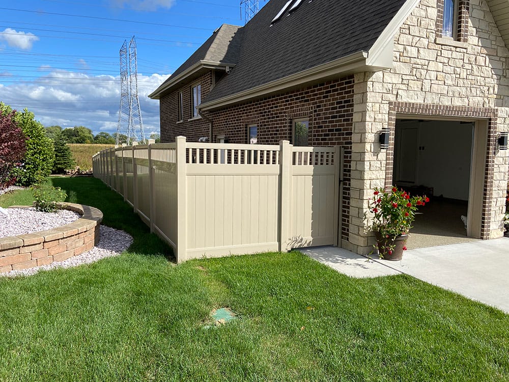 Photo-of-Almond-Vinyl-Privacy-With-Spindle-Fence-6-Foot---Installed-in-Romeoville-Illinois