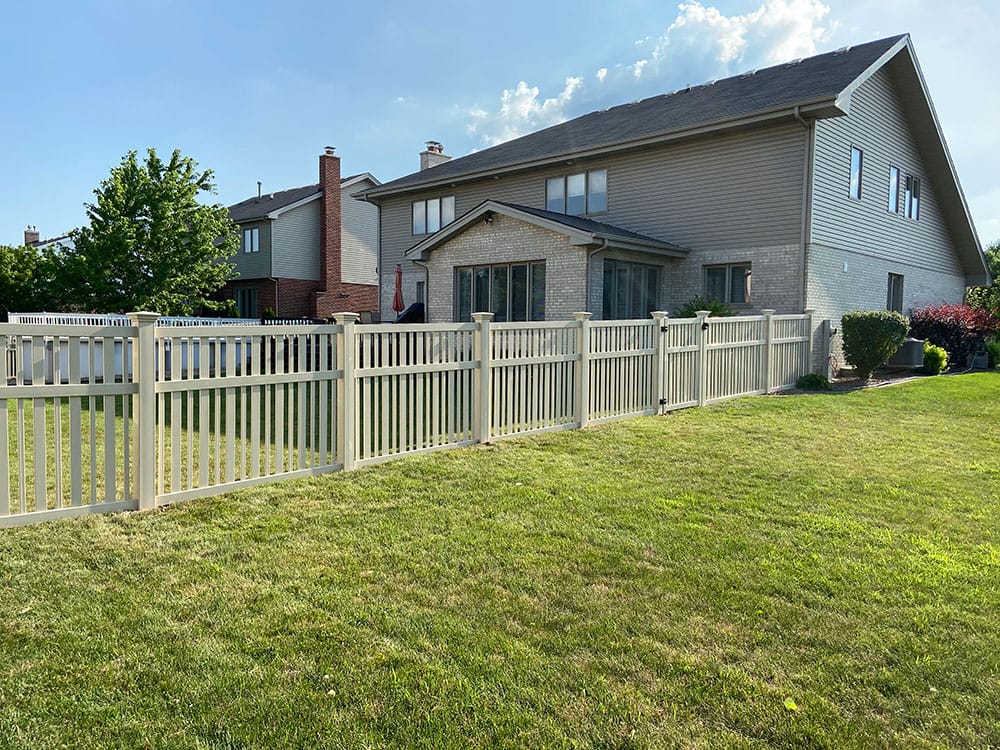 Photo-of-Almond-Vinyl-Spaced-Fence-5-Foot---Installed-in-Wheaton-Illinois