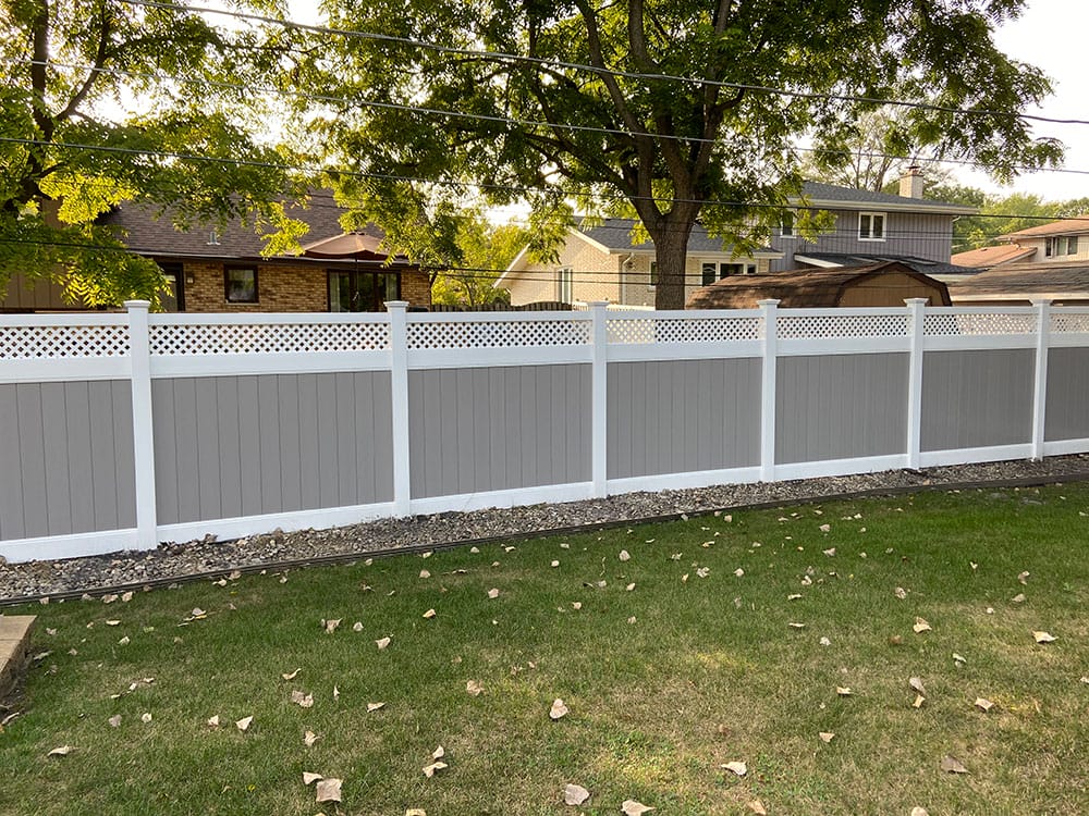 Photo-of-Two-Tone-Vinyl-Privacy-With-Lattice-Fence-6-Foot---Installed-in-Romeoville-Illinois